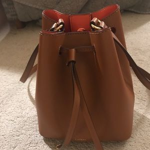 Small leather bucket bag LAUREN orange inside